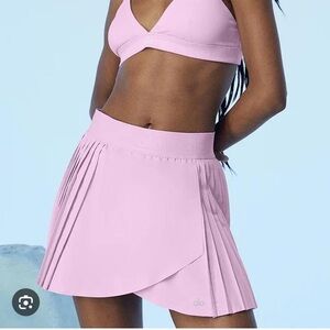 NWOT ALO ACES TENNIS SKIRT SIZE LARGE SUGARPLUM PINK